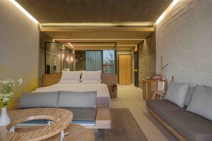 Habitación Deluxe, vista al jardín | Edredón y artículos del minibar gratis 