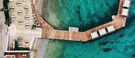 Private beach, free beach shuttle, beach cabanas, sun loungers