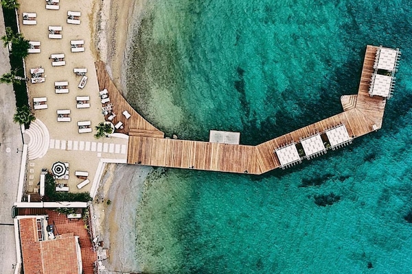 Private beach, free beach shuttle, beach cabanas, sun loungers