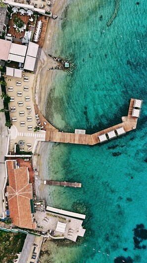 Private beach, free beach shuttle, beach cabanas, sun loungers