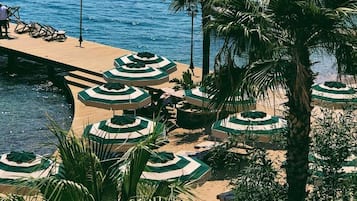 Playa privada y servicio gratuito de transporte a la playa