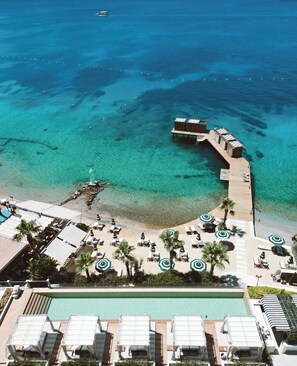 Private beach, free beach shuttle, beach cabanas, sun loungers