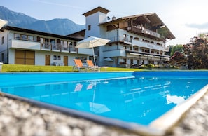 Outdoor pool, pool umbrellas, pool loungers