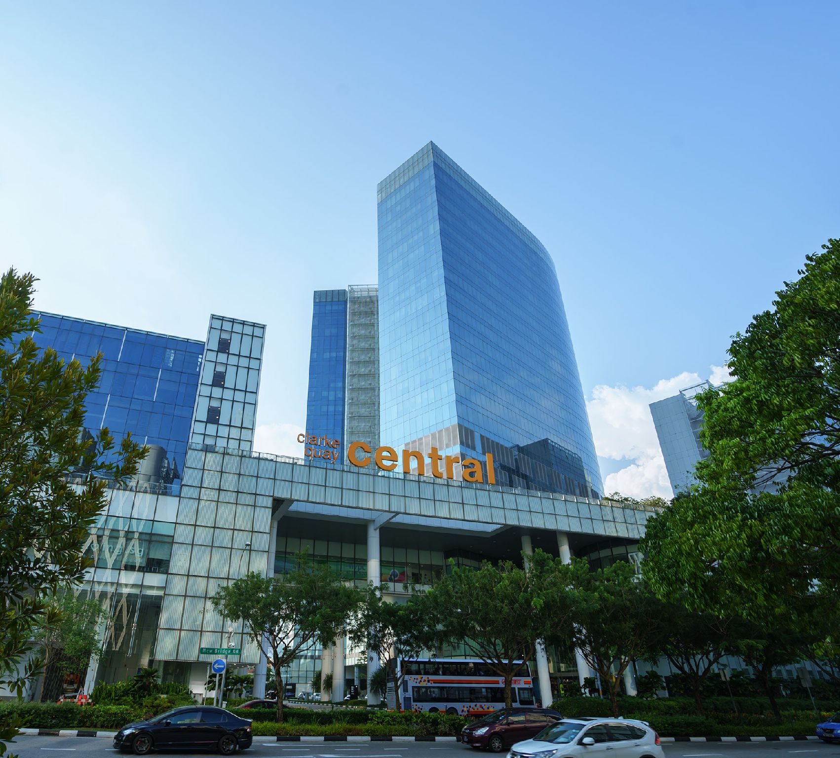 A modern building with a prominent glass facade and the word 'central' displayed.