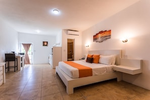 Suite, 1 Bedroom, Kitchenette, Resort View | In-room safe, desk, soundproofing, iron/ironing board