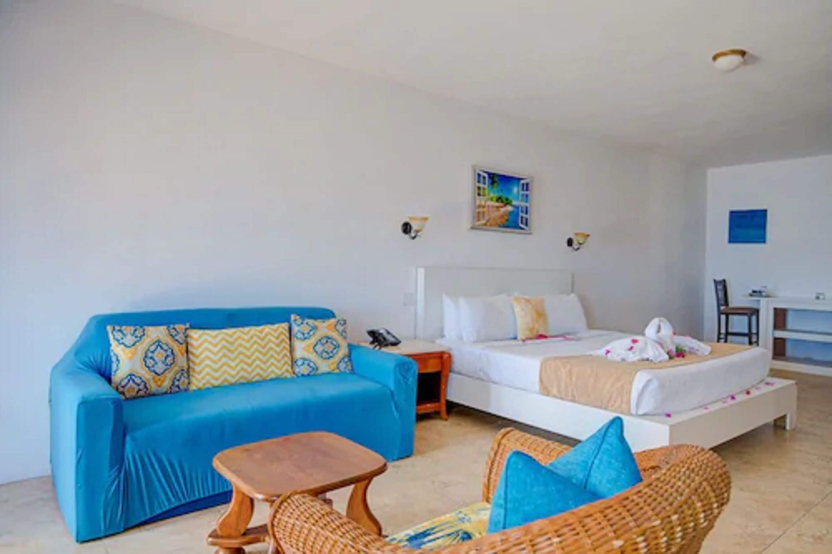 suite, 1 bedroom, kitchen, ocean view | in-room safe, desk, soundproofing, iron/ironing board