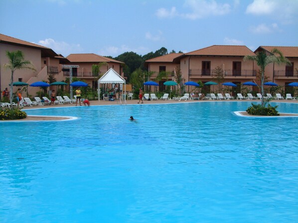 2 outdoor pools, pool umbrellas, pool loungers
