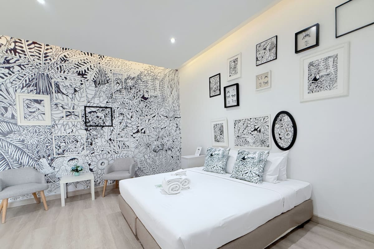 Deluxe King Room | Frigobar (abastecido com itens grátis), cofres nos quartos