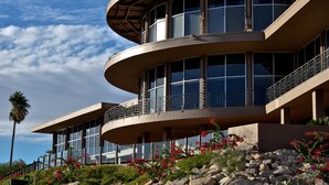 A multi-story building with balconies and large windows. - Mission Hill Casitas (Tucson)