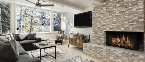 Deluxe kamer (Chat Snow 3B) | Woonruimte | Een flatscreentelevisie