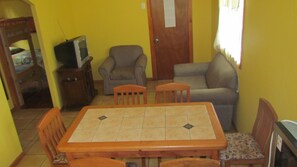 Bungalow, 2 Bedrooms (5 Adults) | In-room dining - Cabañas Peretei (Hanga Roa)