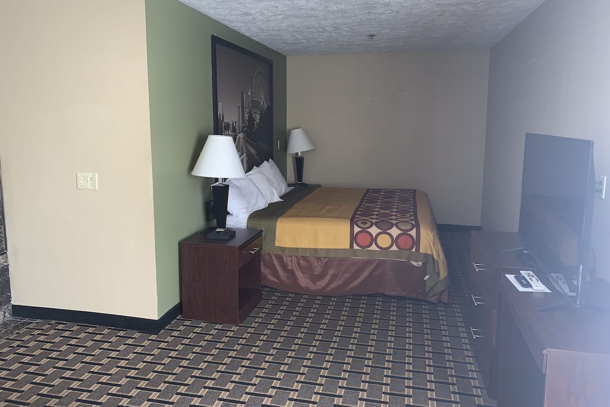 Habitación Deluxe, 1 cama King size | Decoración personalizada, muebles diferentes, escritorio y wifi gratis