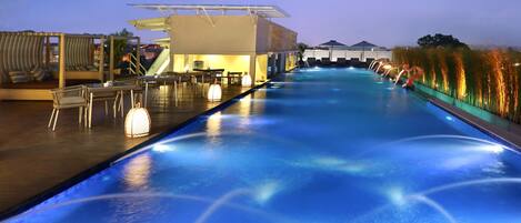 Outdoor pool, open 8:00 AM to 9:00 PM, free pool cabanas, pool umbrellas