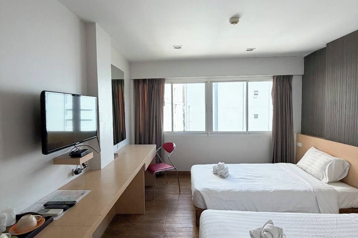 Superior Twin Room, City View | In-room safe, desk, WiFi (free), bed sheets