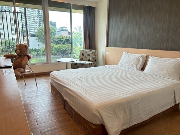 Habitación doble superior, vista al jardín | Caja de seguridad en la habitación, escritorio y wifi gratis 