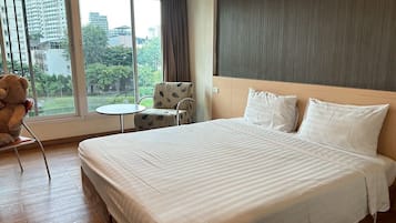 Superior Double Room, Garden View | In-room safe, desk, free WiFi, bed sheets