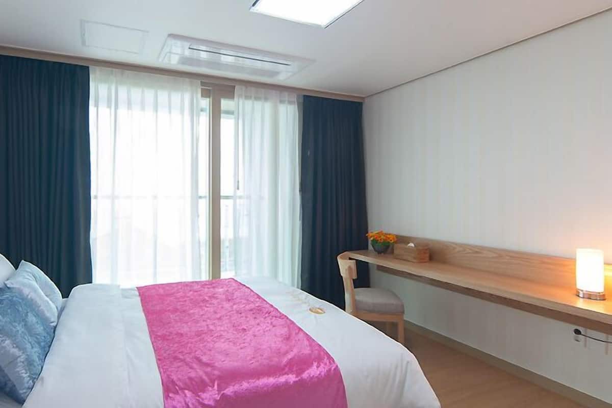 Desk, blackout curtains, soundproofing, iron/ironing board