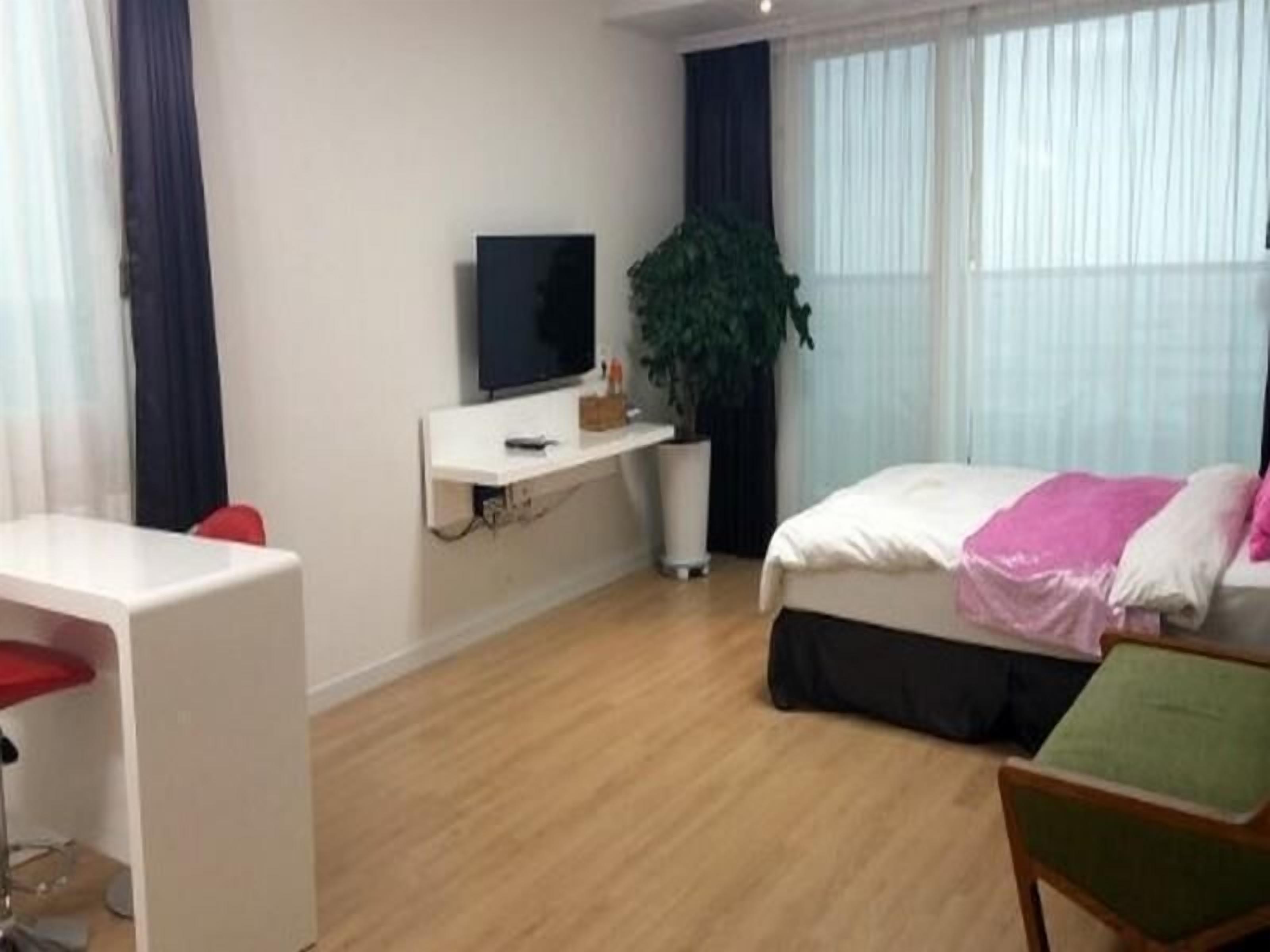 Desk, blackout drapes, soundproofing, iron/ironing board