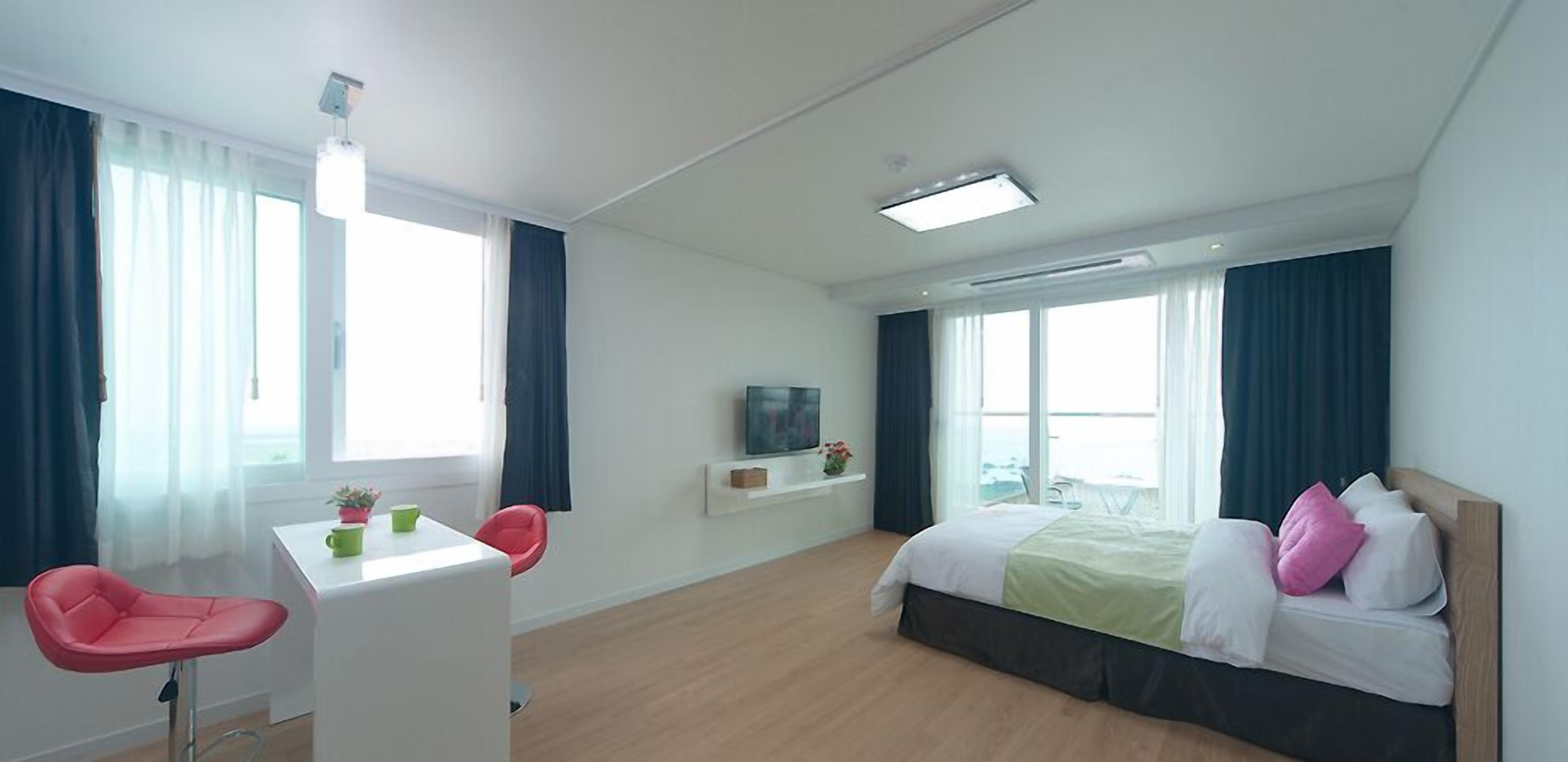 desk, blackout curtains, soundproofing, iron/ironing board