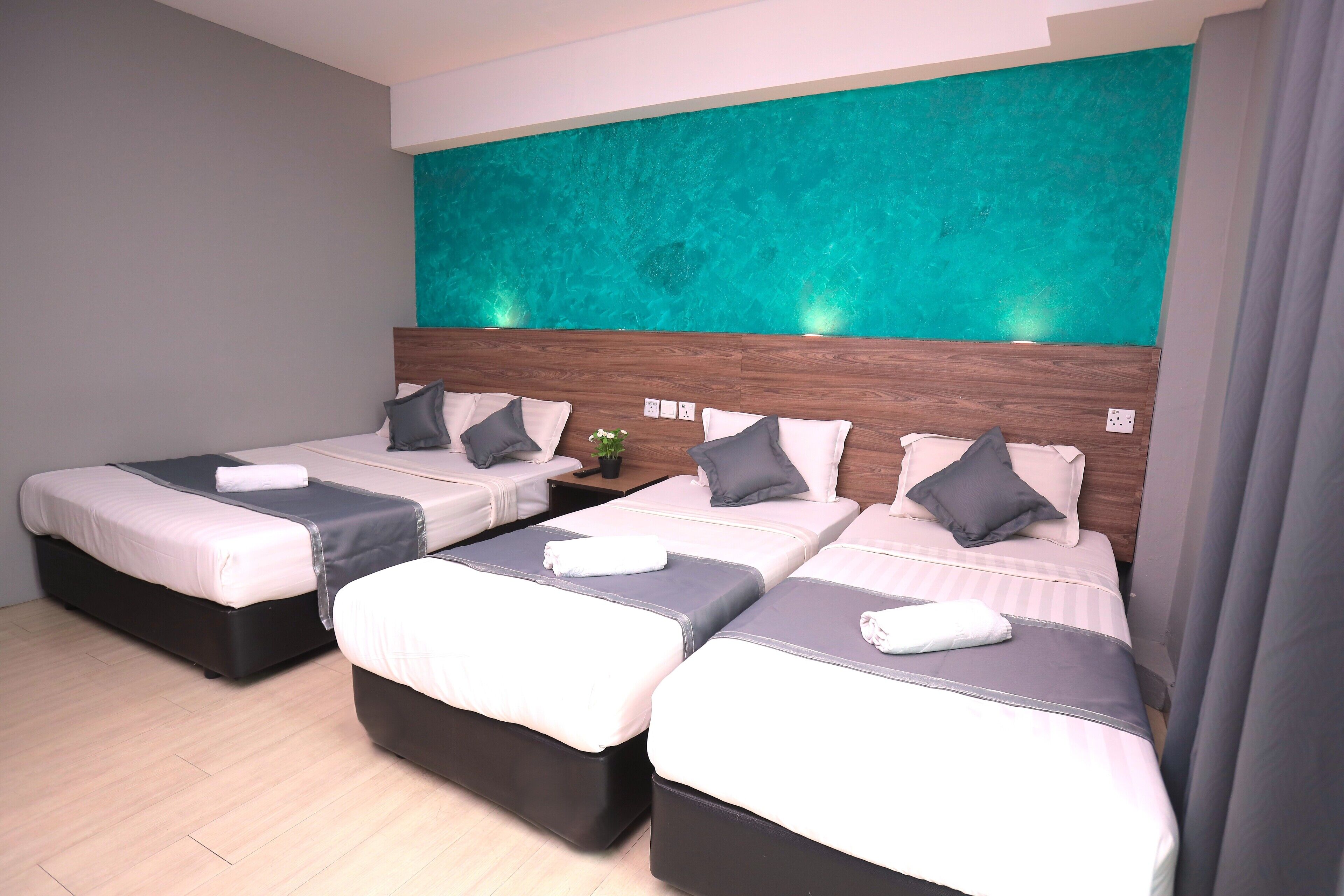 Family Room | In-room safe, desk, blackout drapes, iron/ironing board