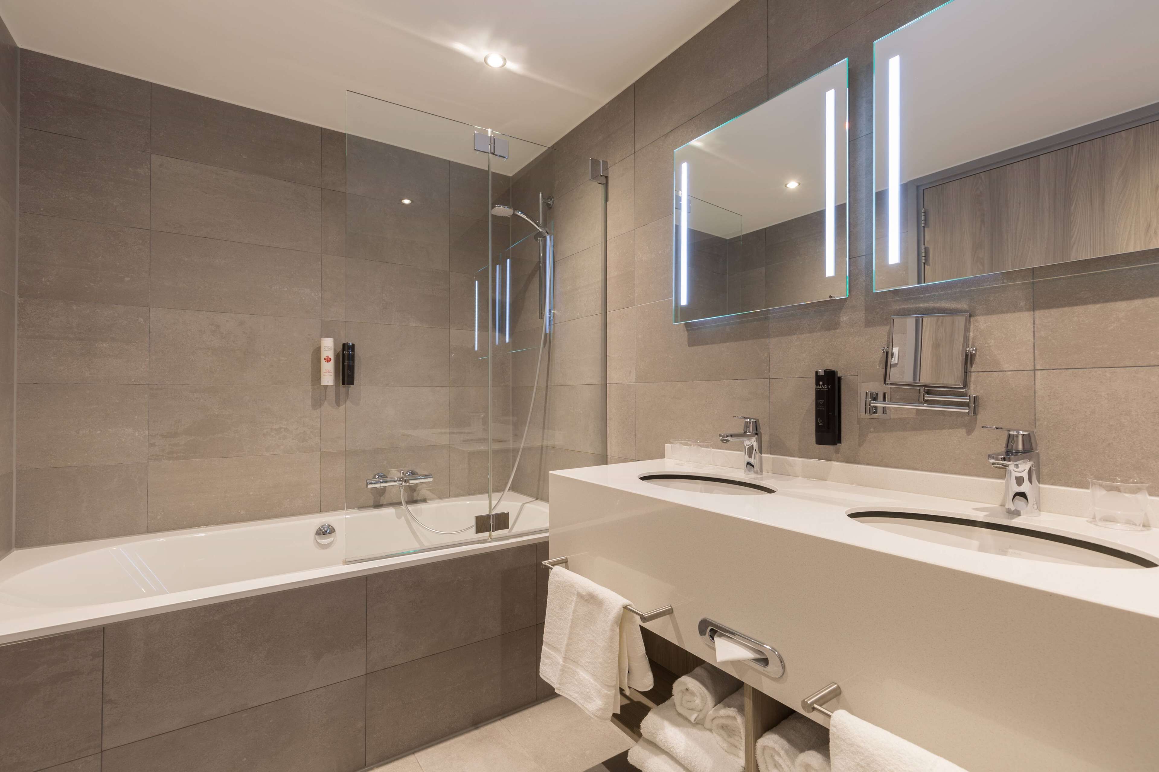 eco-friendly toiletries, hair dryer, towels