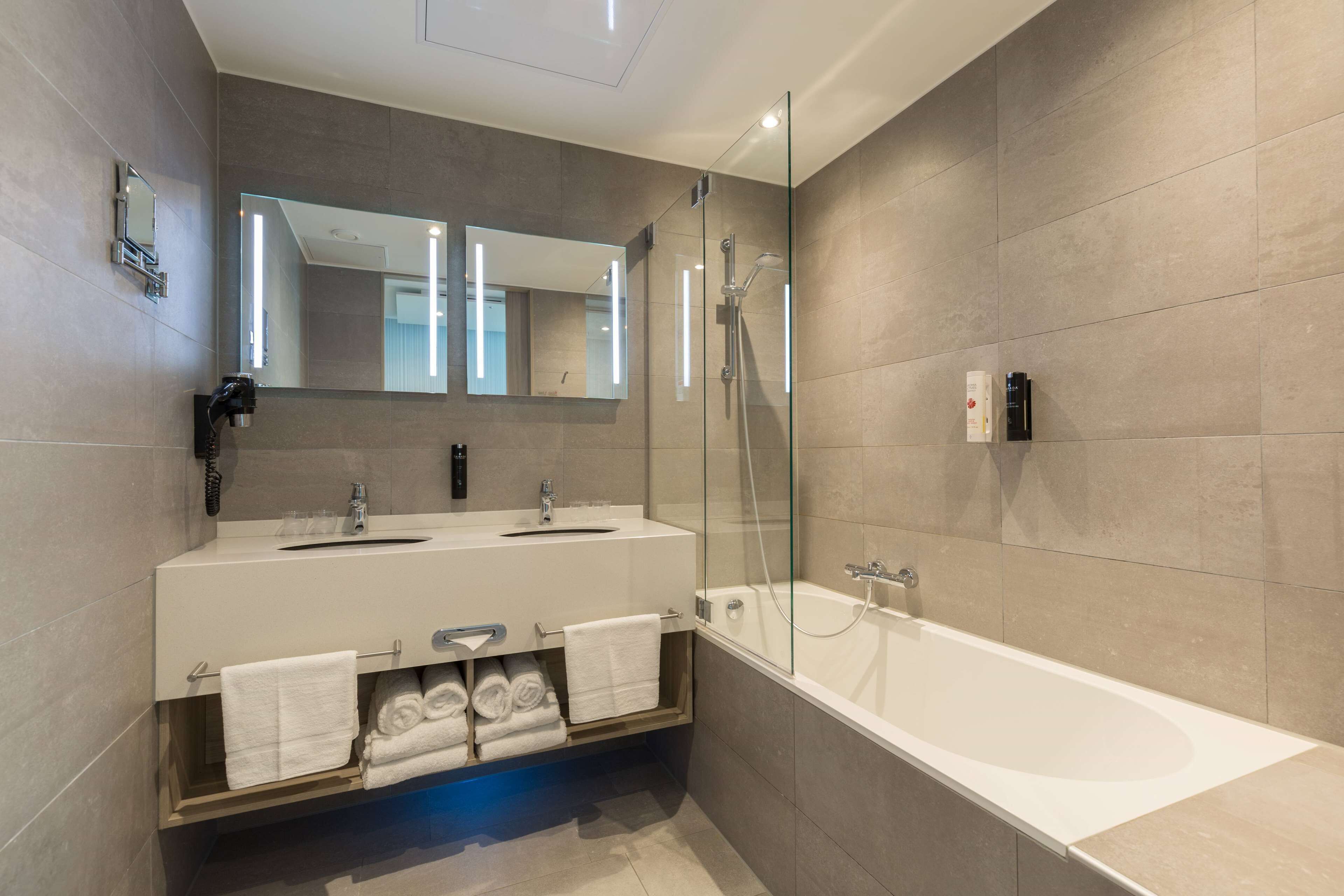 family room, multiple beds | bathroom | eco-friendly toiletries, hair dryer, towels