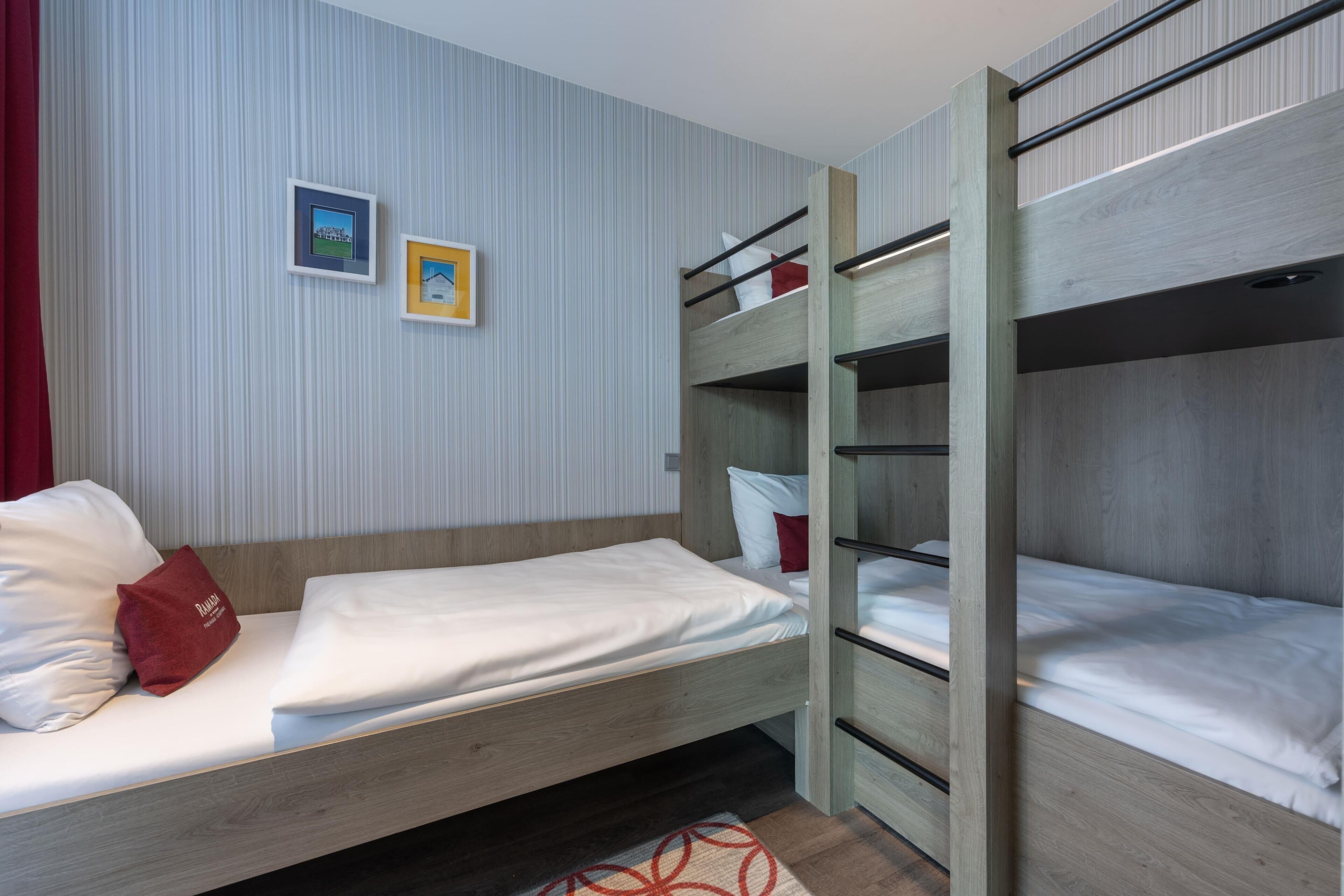 Family Room, Multiple Beds | In-room safe, desk, soundproofing, free WiFi