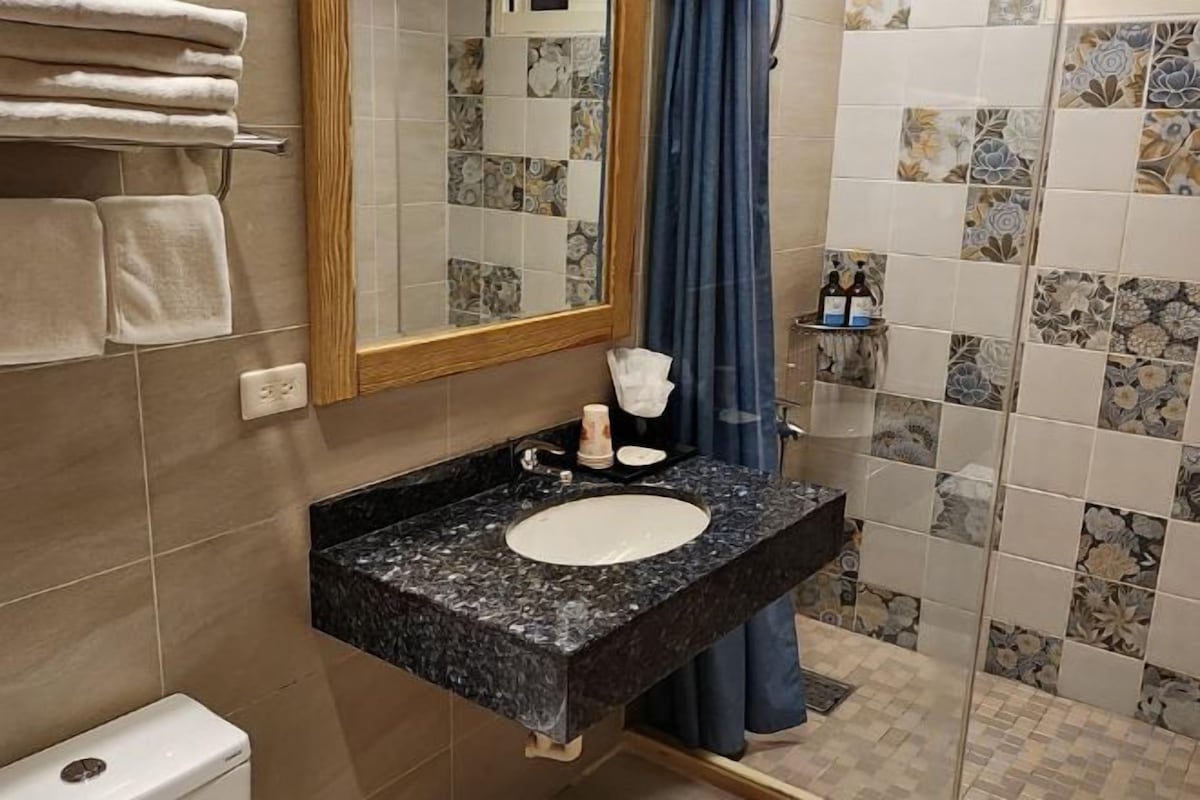 Bathroom | Shower, slippers, towels