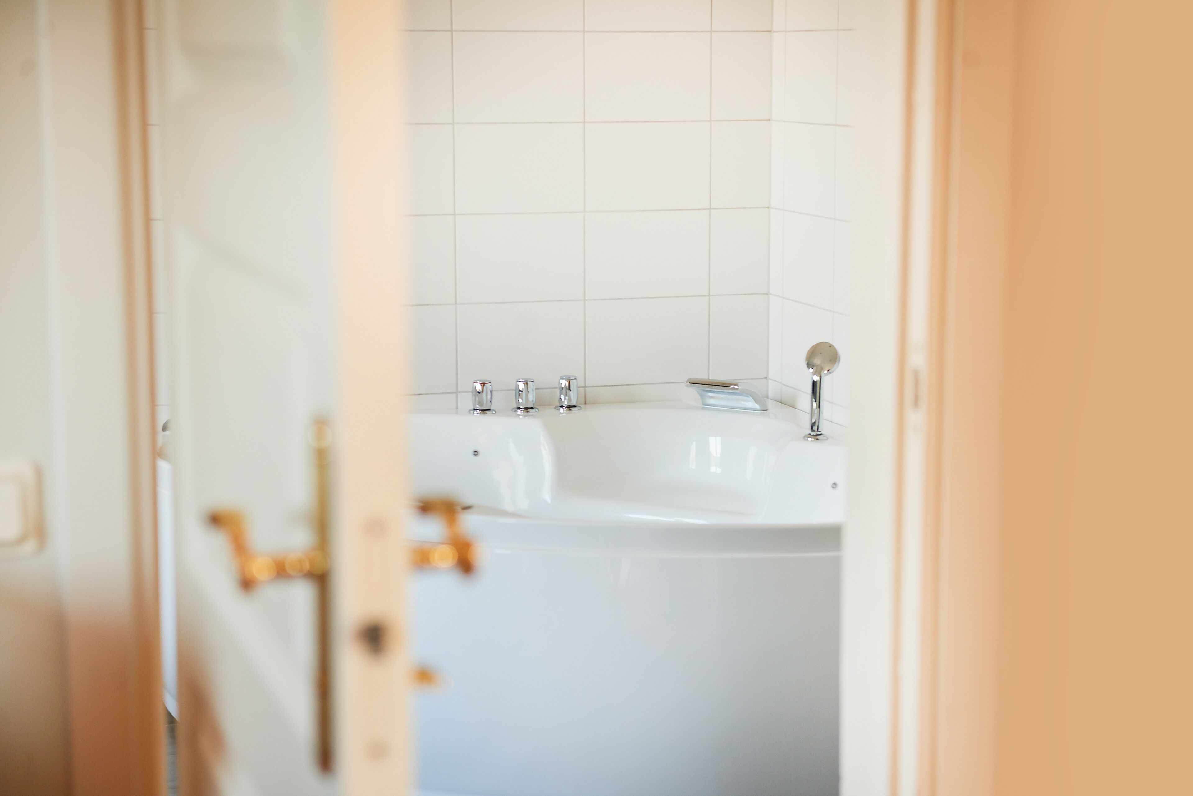 suite | bathroom | hair dryer, bathrobes, slippers, towels