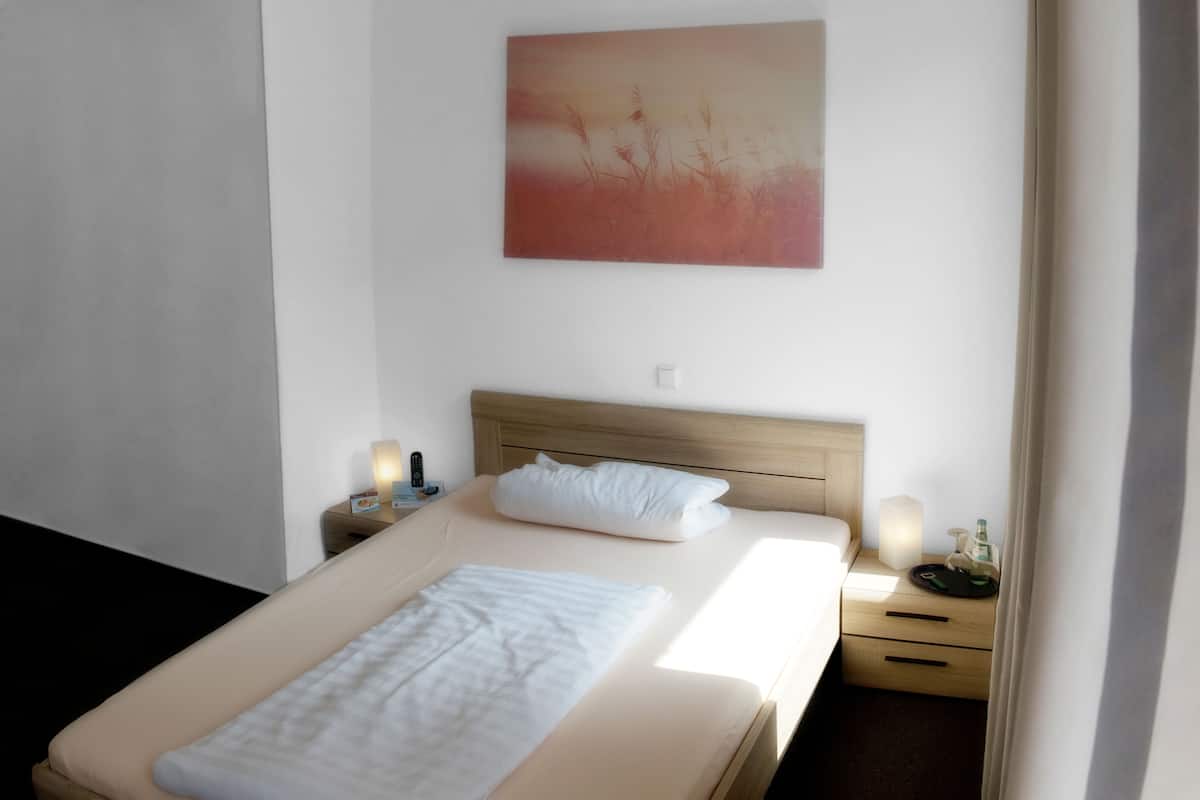 Desk, free WiFi, bed sheets