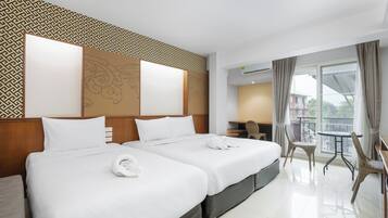 Deluxe Triple Room, Multiple Beds | Minibar, in-room safe, desk, free WiFi