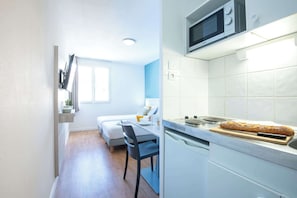Fridge, microwave, stovetop, cookware/dishes/utensils