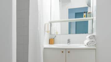 Eco-friendly toiletries, hair dryer, towels