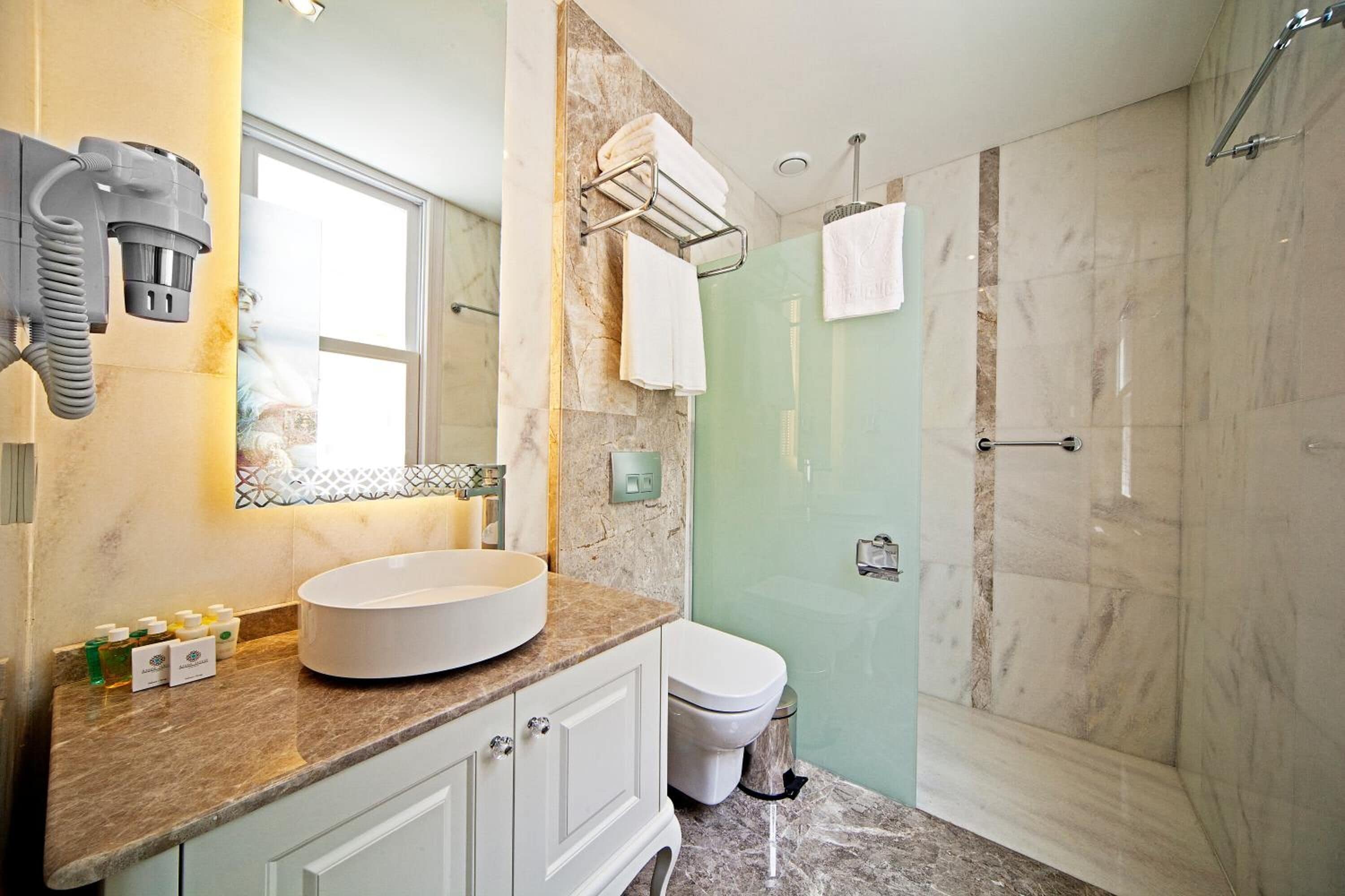 shower, free toiletries, hair dryer, bathrobes