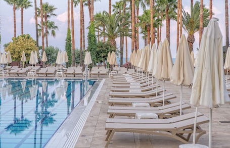 Indoor pool, seasonal outdoor pool, pool umbrellas, sun loungers