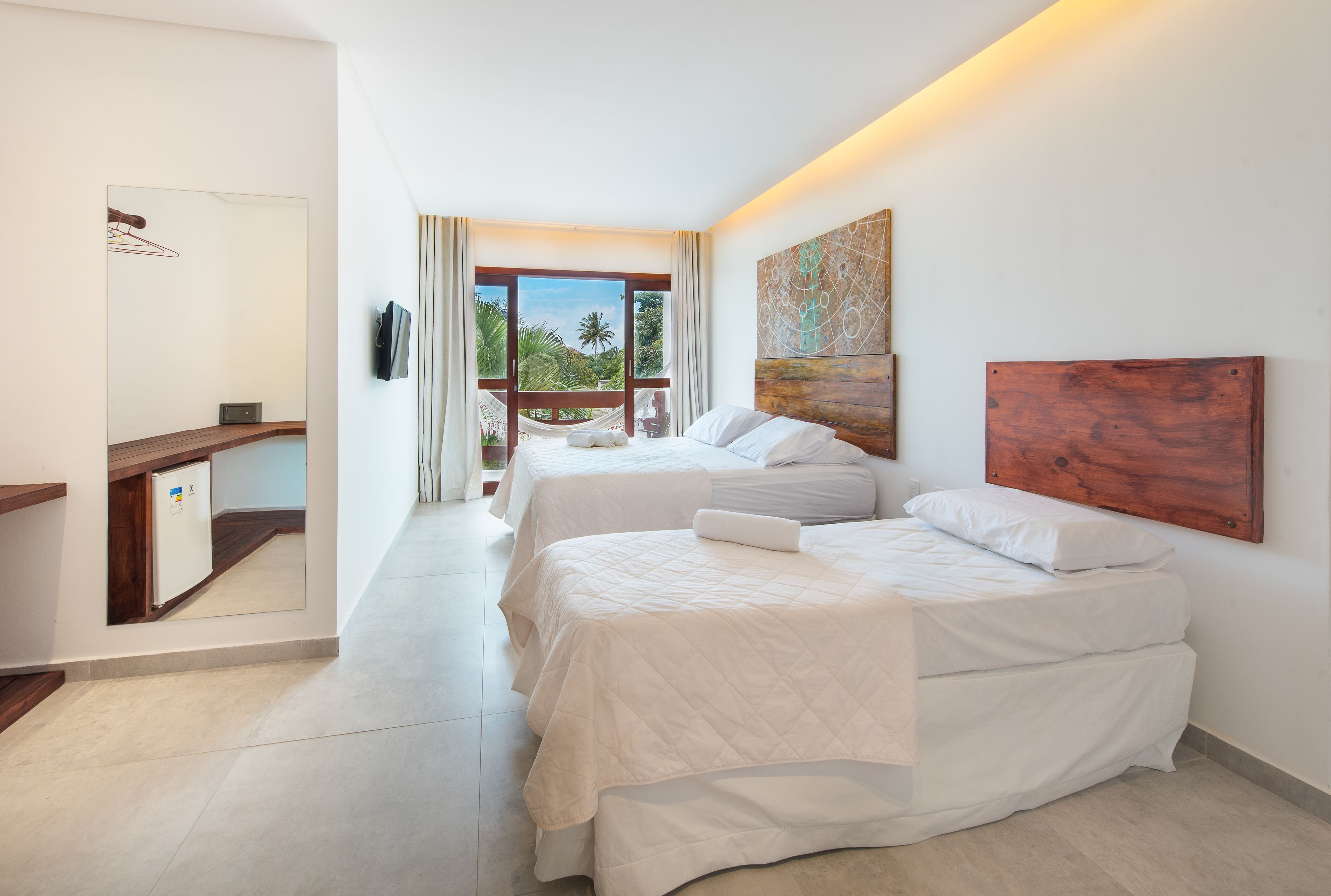 deluxe triple room | 1 bedroom, minibar, in-room safe, blackout curtains