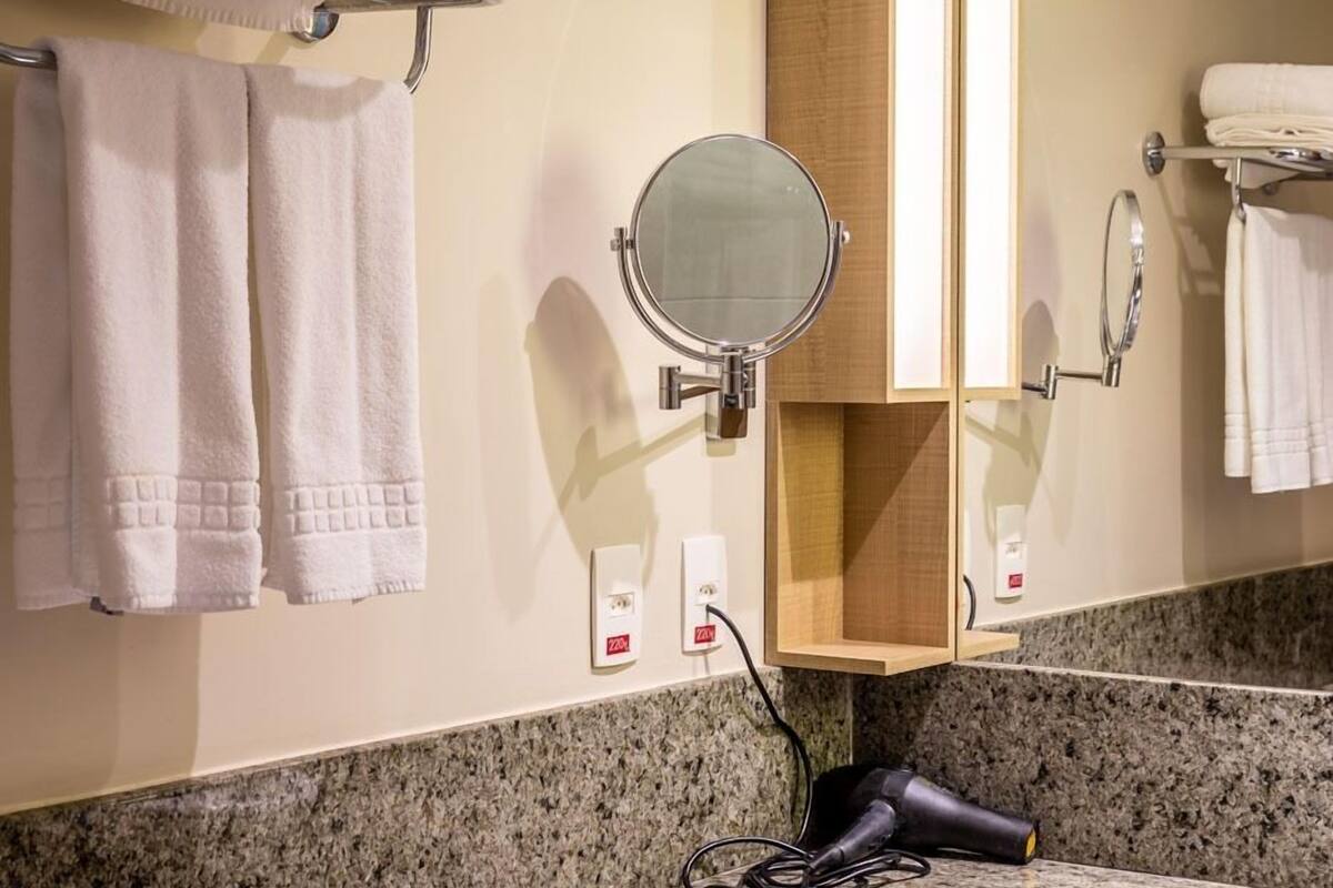 superior female room | bathroom | shower, rainfall showerhead, free toiletries, hair dryer