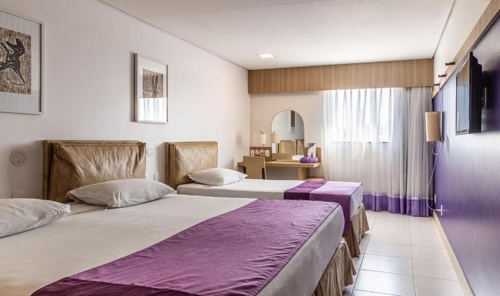 family room | 1 bedroom, minibar, in-room safe, desk