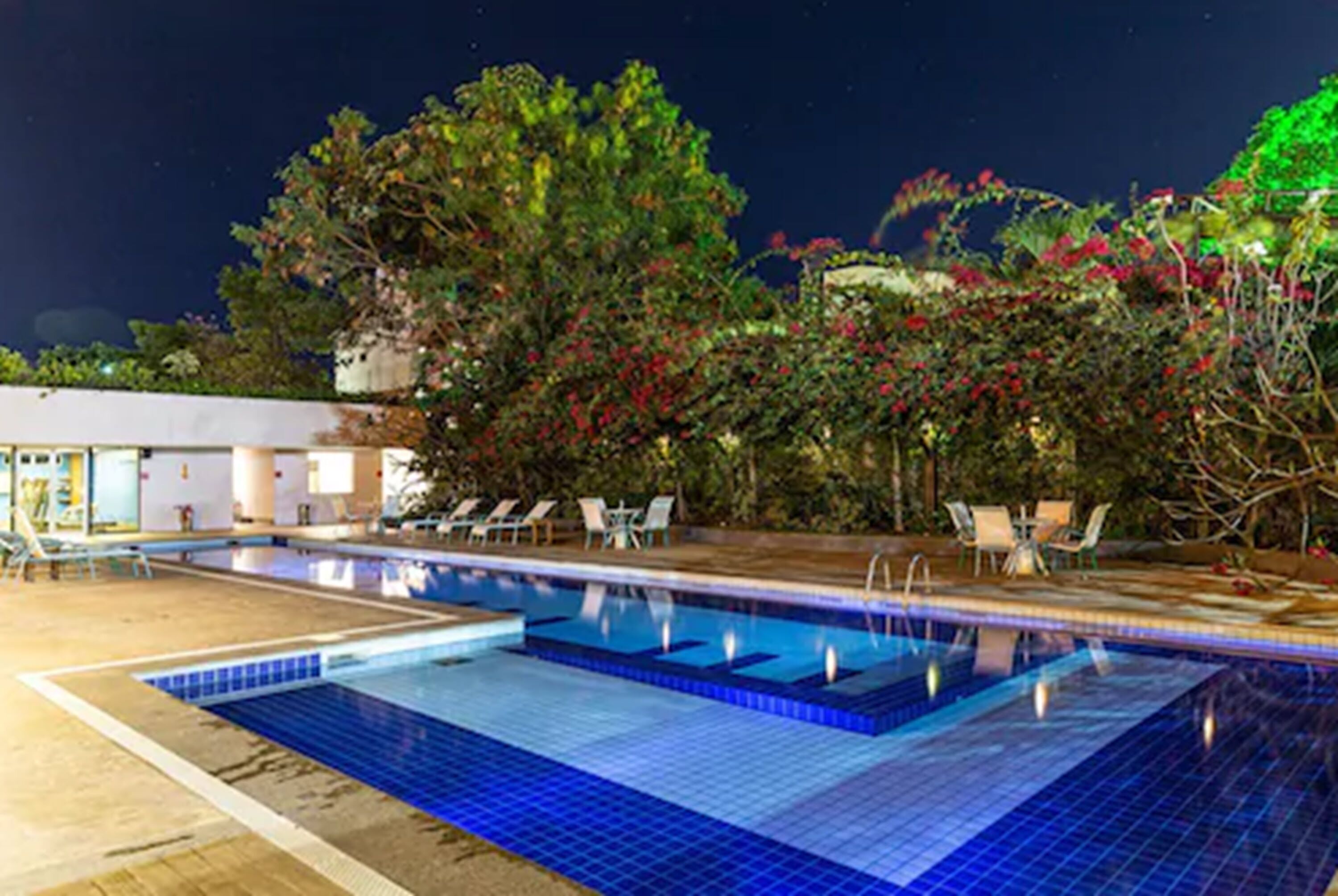 Outdoor pool, open 7:00 AM to 11:00 PM, sun loungers