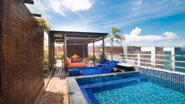 Outdoor pool, sun loungers - A Residence (Kuta)