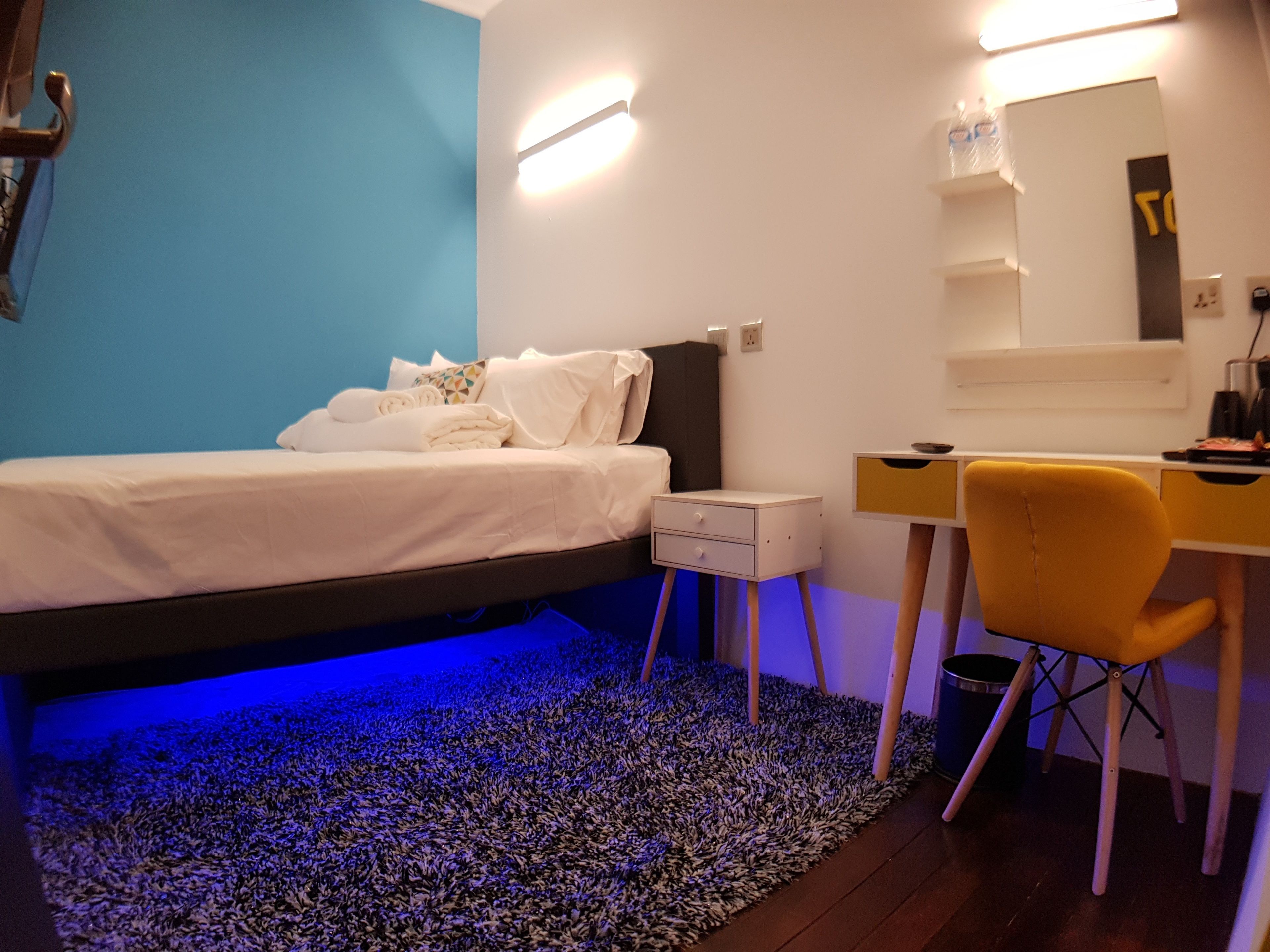 Deluxe Double Room, 1 Queen Bed, Shared Bathroom | Down comforters, iron/ironing board, free WiFi, bed sheets