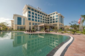 Outdoor pool, open 6:00 AM to 8:00 PM, pool loungers