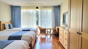 Chambre triple | Draps en coton égyptien, literie de qualité, couette en duvet