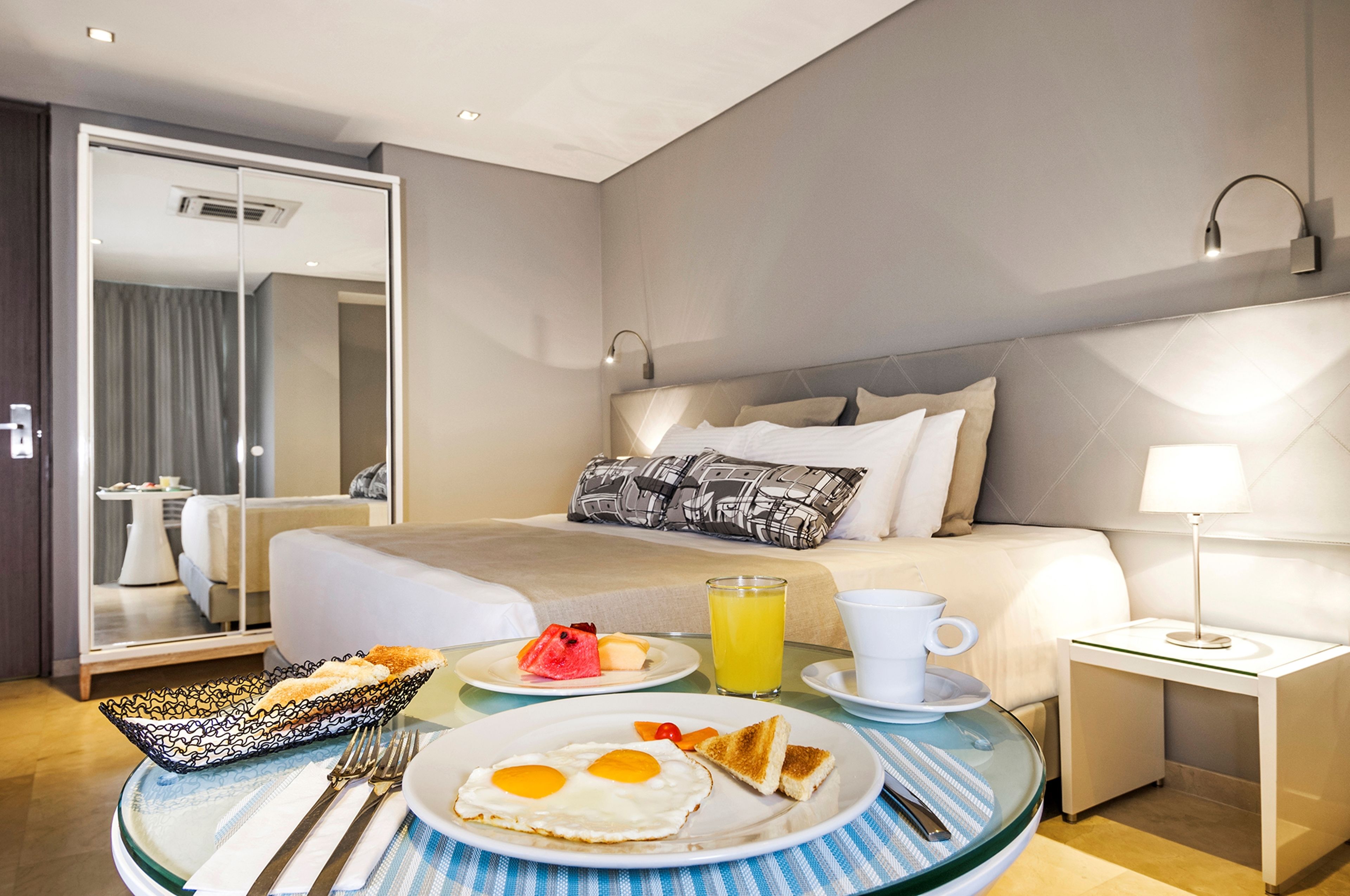 Premium bedding, down comforters, pillowtop beds, minibar