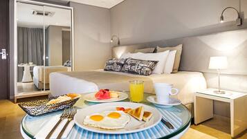 Premium bedding, down comforters, pillowtop beds, minibar