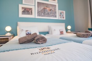 In-room safe, desk, laptop workspace, bed sheets - Canyon Roadhouse (Fish River Canyon)