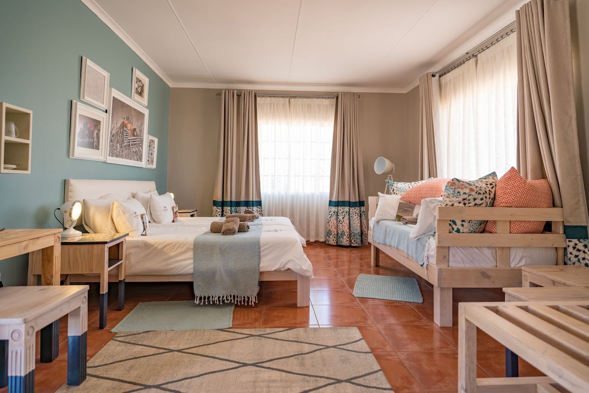 in-room safe, desk, laptop workspace, bed sheets