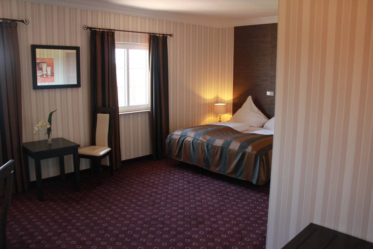 Standard Double Room | Living area | TV