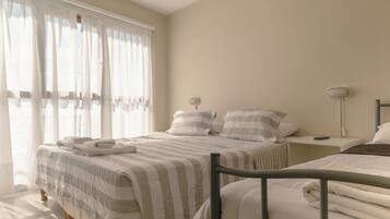 Hypo-allergenic bedding, down duvets, in-room safe, free WiFi