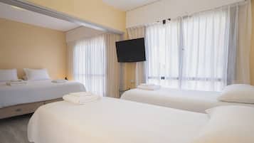 Hypo-allergenic bedding, down duvets, in-room safe, free WiFi